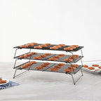 Restaurantware Met Lux 15.7 x 9.8 x 8.3 Inch Wire Baking Rack Set 1 Stackable Oven Wire Rack Set - 3-Tier Design Oven-Ready Up To 392F Black Iron Cooling Rack Set With Collapsible Feet