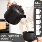 Steinzeit Design Tea Pot with Warmer (44 oz) - Premium Ceramic Teapot with Infuser for Loose Tea - Black Teapot Ceramic with Removable Steamer