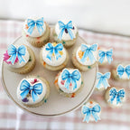 Gyufise 50Pcs Edible Blue Bowknot Cupcake Toppers Wafer Paper Bowknot Cake Dessert Picks Baby Shower Princess Cupcake Toppers for Birthday Party Decoration Supplies