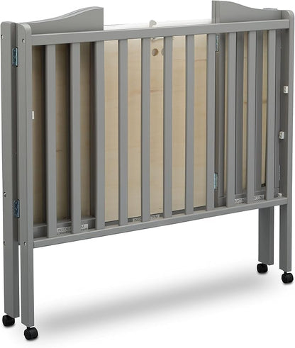 Delta Children Folding Portable Mini Baby Crib - Image 11