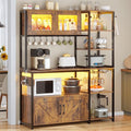 Itaar Bakers Rack with Power Outlet and LED Light, 45.3 Inch Farmhouse Coffee Bar Cabinet, Kitchen Microwave Stand with Storage, Glass Cabinet, Goblet Holder and 8 Hooks (Rustic Brown)