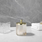 Glass Jar with Metal Lid for Bathroom Organization, Clear Apothecary Jar for Cotton Balls, Q Tips, and Small Accessories, Stylish Bathroom Storage Container Tan, Gold